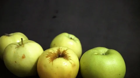 Green apples on a black background. fruit on black background. Stock Footage 99400968
