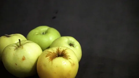 Green apples on a black background. fruit on black background. Stock Footage 99400969