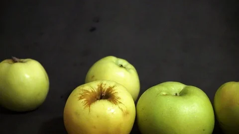 Green apples on a black background. fruit on black background. Stock Footage 99400999