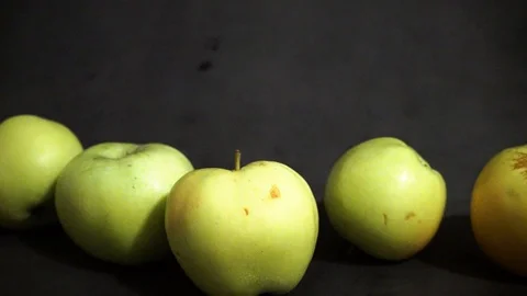Green apples on a black background. fruit on black background. Stock Footage 99401025