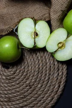 Green apples on a dark background. Fruit theme Stock Photos