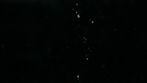 Green apples fall into clear water with bubbles slowmotion Stock Footage 125812583