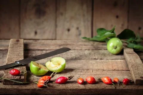 Green apples on an old box Stock Photos