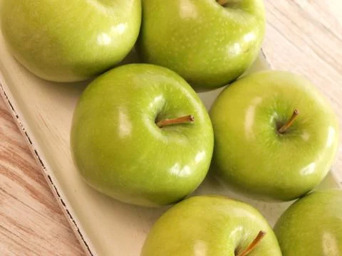 Green apples Stock Photos