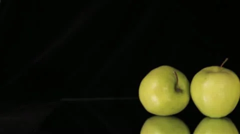 Green Apples Slider on Black Background Stock Footage 11403582