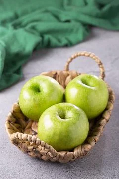 Green apples on the table. Stock Photos