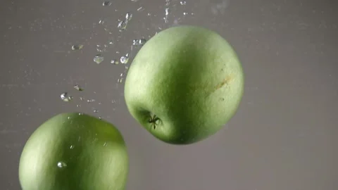 Green apples in water Stock Footage 197089824