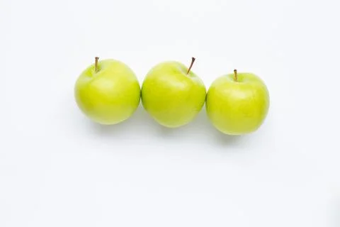 Green apples on white background. Stock Photos