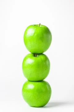 Green apples on a white background.  Stock Photos