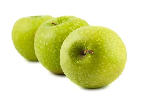 Green apples on a white background Stock Photos