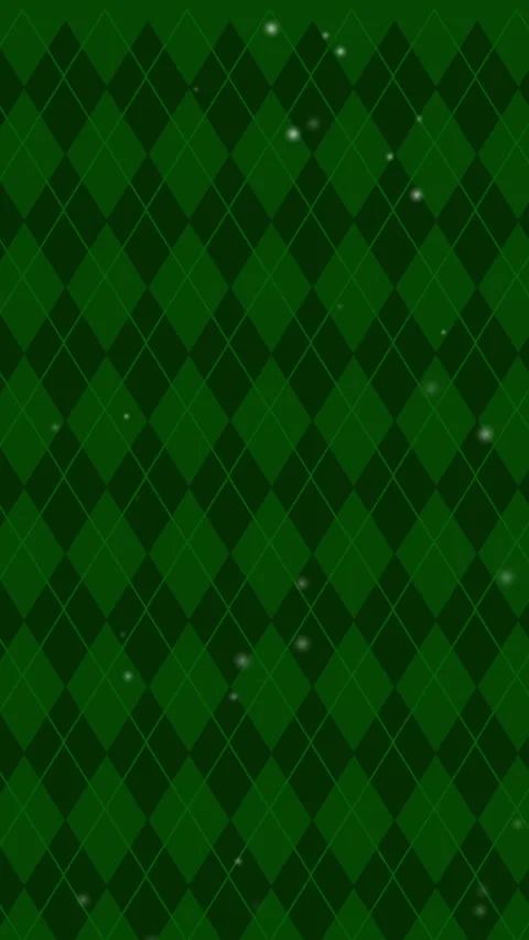 Green argyle pattern with glowing accents. 库存影片 323199644