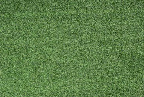 Green artificial grass texture background. Top view Stock Photos