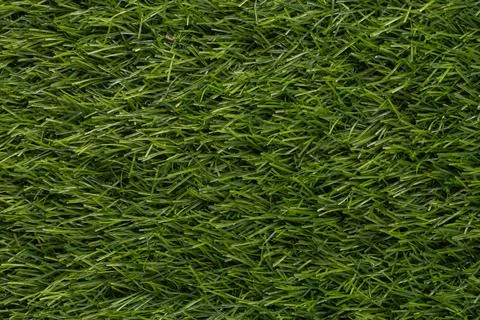 Green artificial grass textures for backgrounds and wallpaper. Stock Photos