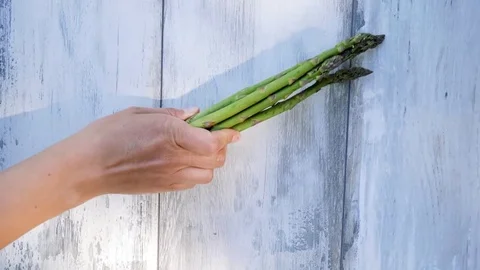 Green asparagus cutting. Stock Footage 76988497