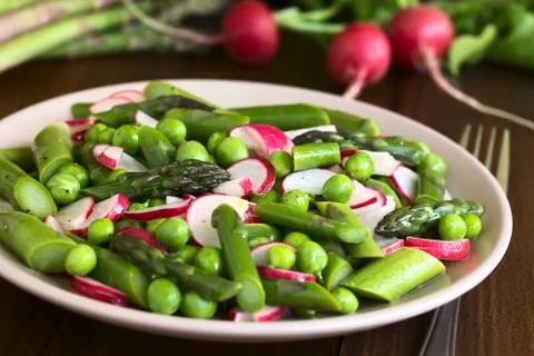 Green Asparagus Radish and Pea Salad Stock Photos