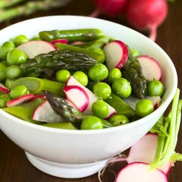 Green Asparagus Radish and Pea Salad Stock Photos