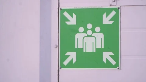 Green assembly point sign on white background. Meeting or assembly point sign Stock Footage 95427182
