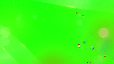 Green background with bokeh lights and reflections Video stock 337764130