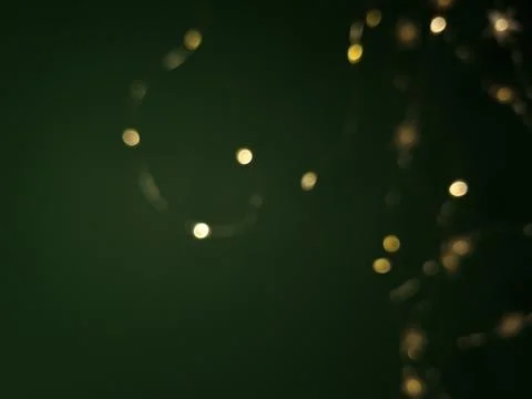 Green background with bokeh lights Stock Photos