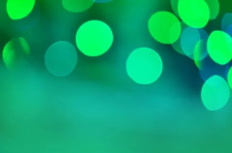 Green background with bokeh Фото