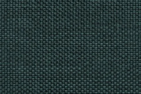 Green background with braided checkered pattern, closeup. Texture of the weav Stock Photos