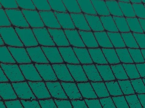 Green background with a dark grid texture resembling a sports court net Illustrazione stock