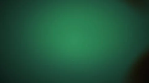 Green background with dark shadows. 스톡 동영상 334687426