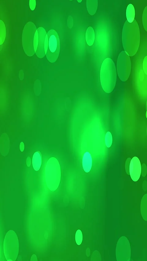 Green background features many bright translucent circles. 스톡 동영상 297510104