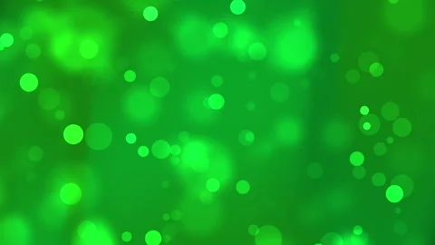 Green background features many bright translucent circles of varying sizes. Stock Footage 297510609