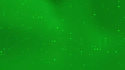 Green background features scattered small bright dots. Stock Footage 296166843