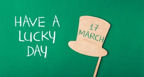 A green background with a hat on it Stock Photos