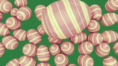 A green background with pink and white striped candys yellow balls bunch of 库存影片 337340588