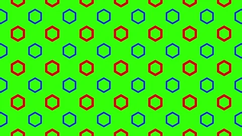 Green background with red hexagons pattern. 스톡 동영상 331610011