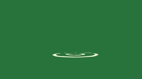 A green background with small hole in the middle and drop of water on screen Stock Footage 335681636