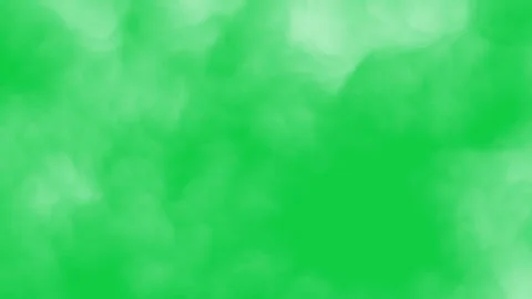 Green background with some white puffy cloud shapes. 스톡 동영상 320237145