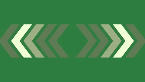 A green background with white arrows and two pointing in different directions Video stock 335130743