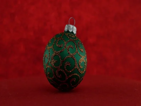 Green ball on red background Stock Footage 70635134