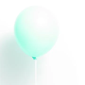 Green balloon on white background with shadow. Strong light. Stock Photos
