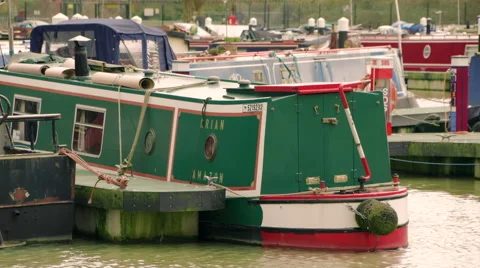 Green Barge Moored on a Dock Stock Footage 61641713