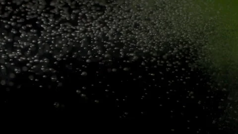 Green Bath Bomb Dissolving in Water With Effervescent Bubbles Stock Footage 274846613
