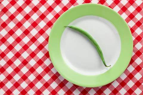 Green bean pod on plate Stock Photos