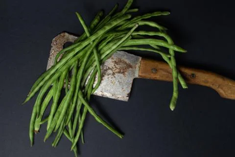 Green beans on a black background.  Stock Photos