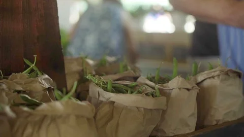 Green Beans in Brown Packages Stock Footage 106556301