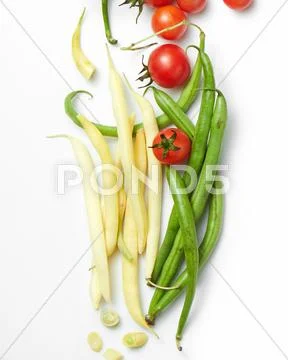 Green beans with cherry tomatoes Stock Photos