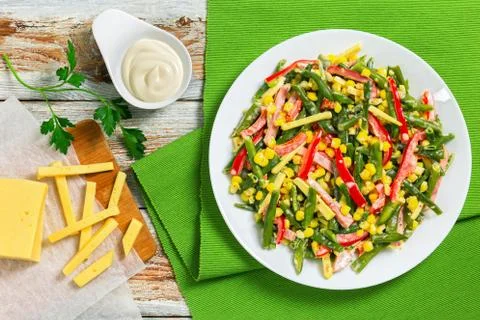 Green beans, corn, ham and cheese salad Stock Photos
