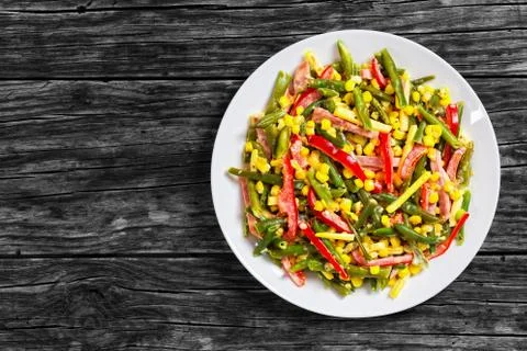 Green beans, corn, ham and cheese salad Stock Photos
