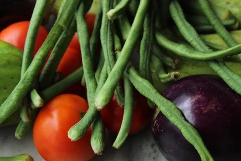 Green beans display with selective focus and fresh various raw organic vegetable Stock Photos