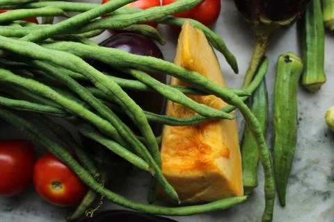 Green beans display with selective focus and fresh various raw organic vegetable 库存照片