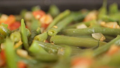 Green beans with vegetables in a pan Stock Footage 100894940