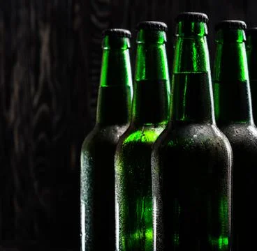 Green beer bottles Stock Photos
